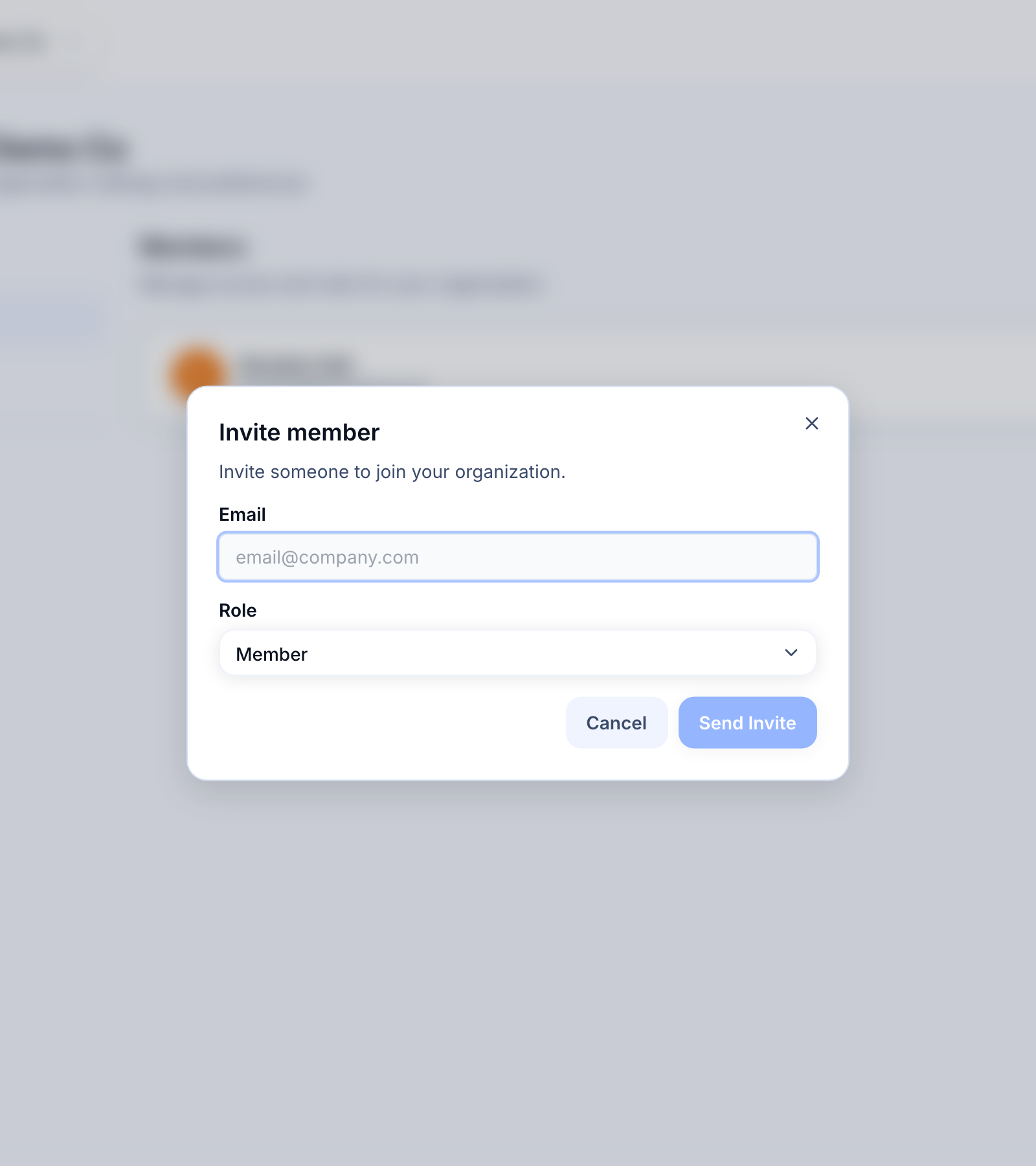 Members, roles, and invitations — Invite member dialog showing email field and role selector